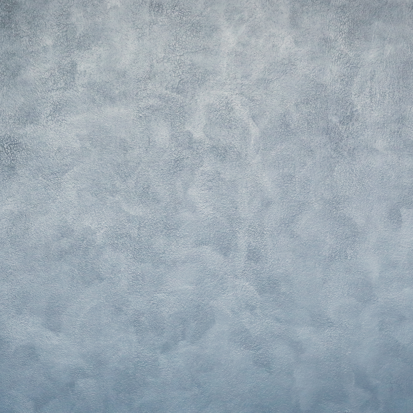 Blå stuckatur med levande struktur